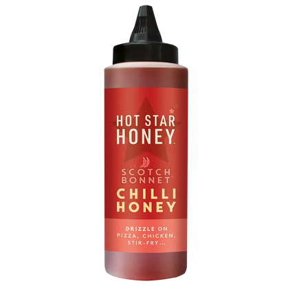 Hot Star Honey Scotch Bonnet Chilli Honey in a bottle, showcasing vibrant Scotch bonnet peppers and golden honey inside.
