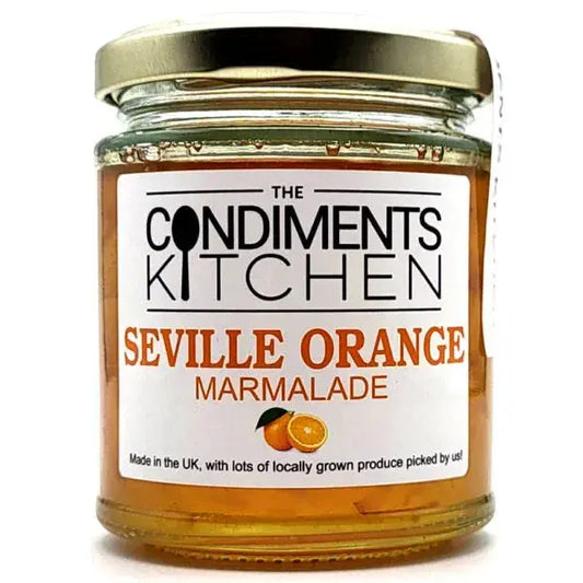 Seville orange marmalade jar by The Condiments Kitchen, 200g, showcasing the bright orange preserve with a textured label.