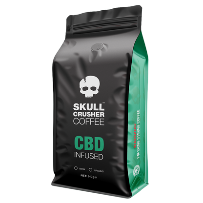 Skull Crusher Coffee infused coffee with skull-shaped packaging and bold branding, showcasing the product's distinctive design.