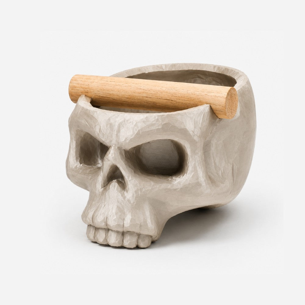 Gothic skull espresso knock box with metallic gold finish and oak bar, designed for coffee enthusiasts and baristas.
