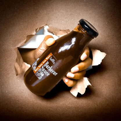 Laffe Sustainable BBQ Sauce bottle with label, showcasing eco-friendly packaging and vibrant branding on a white background.
