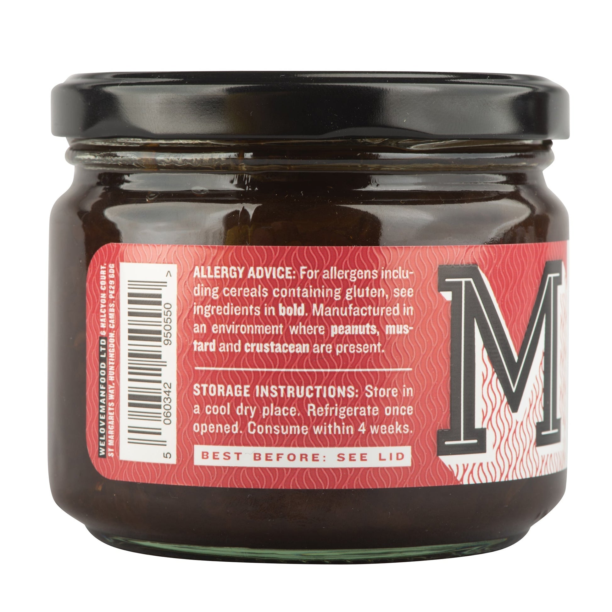 Manfood Smoky Onion Relish in a glass jar, showcasing dark, caramelized onions with a smoky flavor, ready to serve.