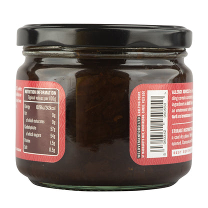 Manfood Smoky Onion Relish in a jar, showcasing its dark, smoky flavor and chunky onion texture.