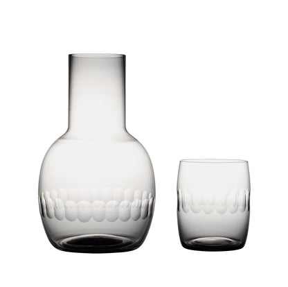 A smoky crystal carafe set with lens design