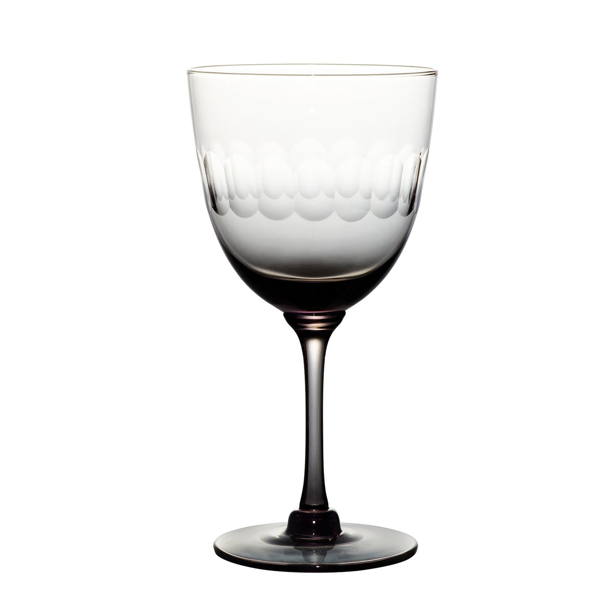 Four smoky crystal wine glasses with lens design from The Vintage List, showing elegant, modern glassware on a neutral background.