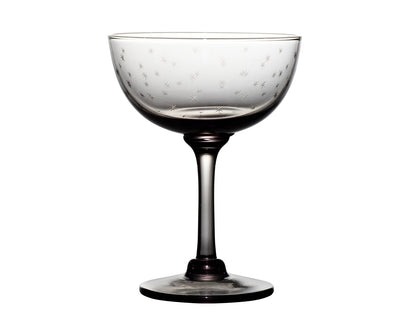 four smoky crystal champagne saucers with stars design