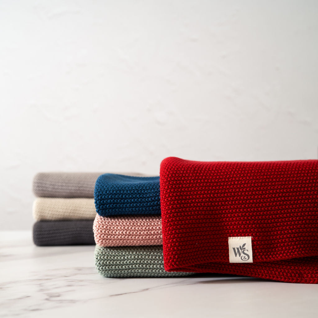 Organic cotton hand towels by Wild And Stone, soft, absorbent, and eco-friendly, featuring a neutral woven design.