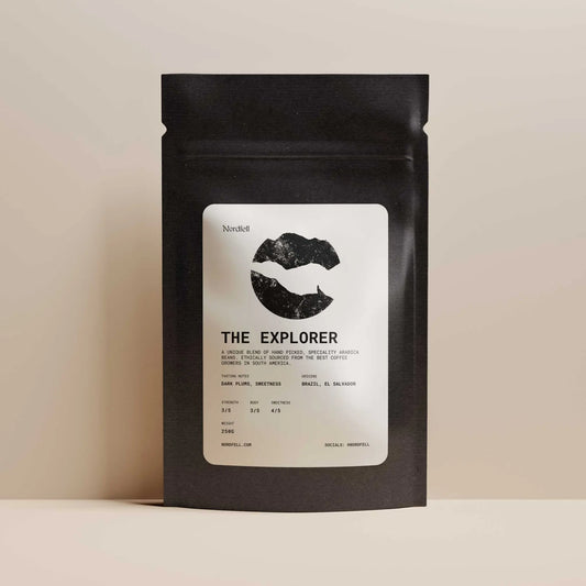 Nordfell The Explorer roasted coffee blend in 250g bag, featuring dark beans with rich, aromatic surface and branding label.