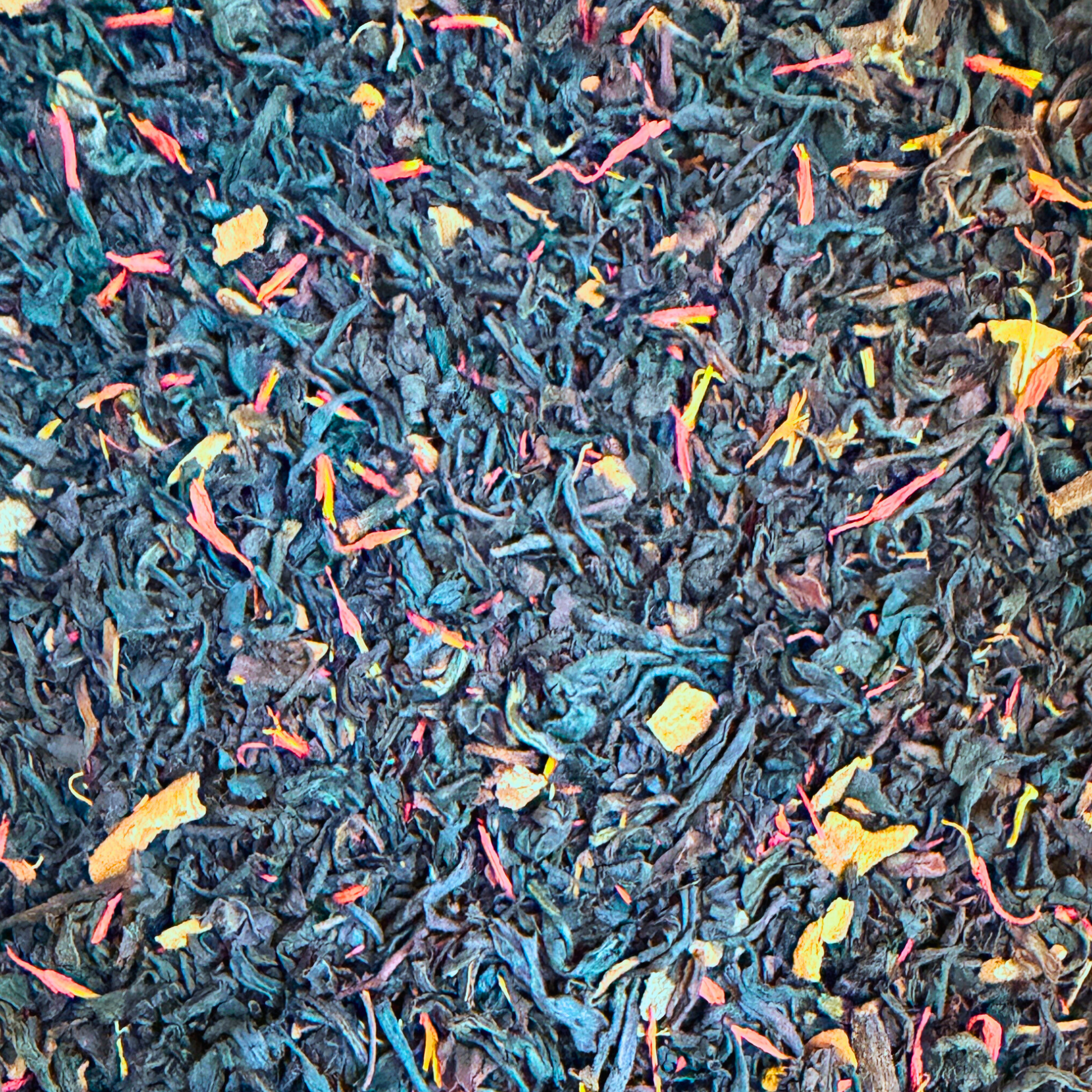 Black mulled wine flavored black tea by Porter Hill Tea Company featuring a steaming cup with spices and citrus slices.