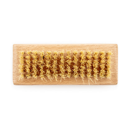 Wild And Stone biodegradable natural bristle nail brush with wooden handle for gentle nail cleaning and grooming.
