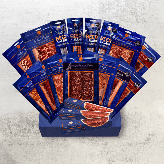 Assorted Bray Cured charcuterie selection featuring cured meats and sausages on a wooden board, showcasing the Ultimate Taste of Bray Cured.