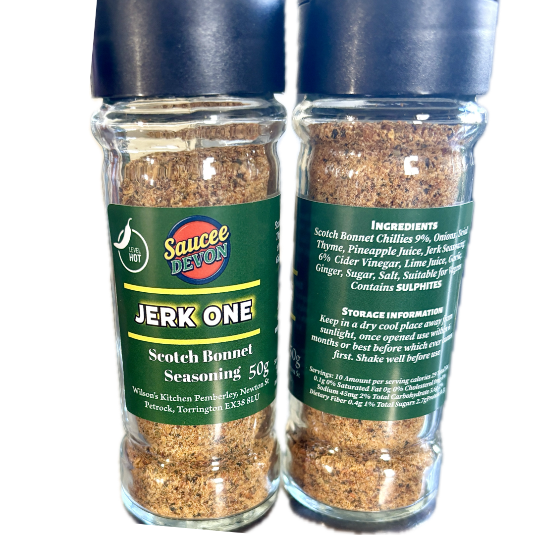 Wilson’s Kitchen Jerk Scotch Bonnet Seasoning in a jar, artisan chili sauce with vibrant spices and fresh Scotch bonnet peppers
