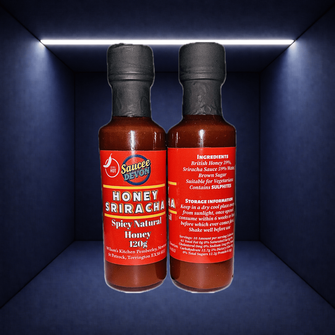 Wilson’s Kitchen Honey Sriracha Sauce in a glass bottle, showcasing the vibrant orange-red chili and honey blend.