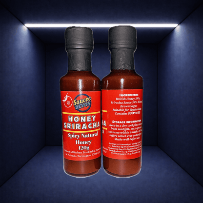 Wilson’s Kitchen Honey Sriracha Sauce in a glass bottle, showcasing the vibrant orange-red chili and honey blend.