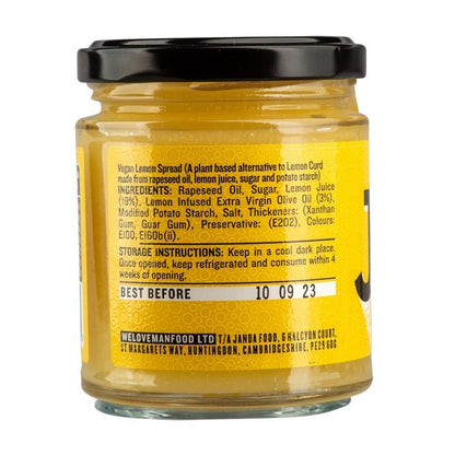 Vegan Lemon Curd by Manfood, artisan lemon spread in a jar, showcasing bright yellow lemon curd with fresh lemon slices and a spoon.