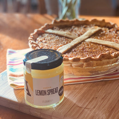 Vegan Lemon Spread by Janda, smooth yellow spread in a glass jar, showcasing fresh lemon flavor and vibrant color.