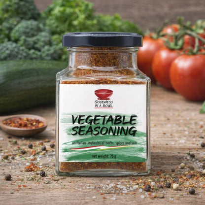 Goodness in a Bowl vegetable seasoning rub with colorful dried herbs and spices in a jar for flavorful vegetable dishes.