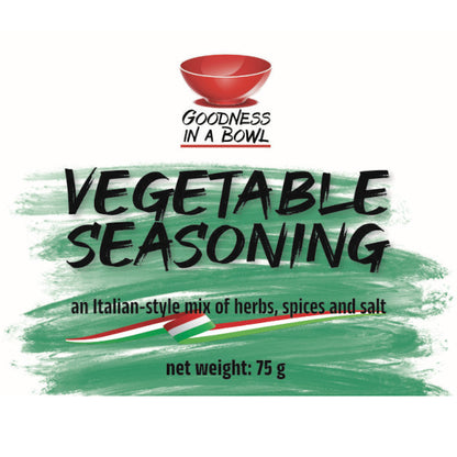Close-up of GOODNESS IN A BOWL vegetable seasoning rub with colorful herbs and spices in a jar, ideal for enhancing vegetable dishes.