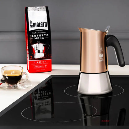 Bialetti Venus induction stovetop coffee maker with copper finish, Brew Italia hardware, showing the detailed coffee pot design.