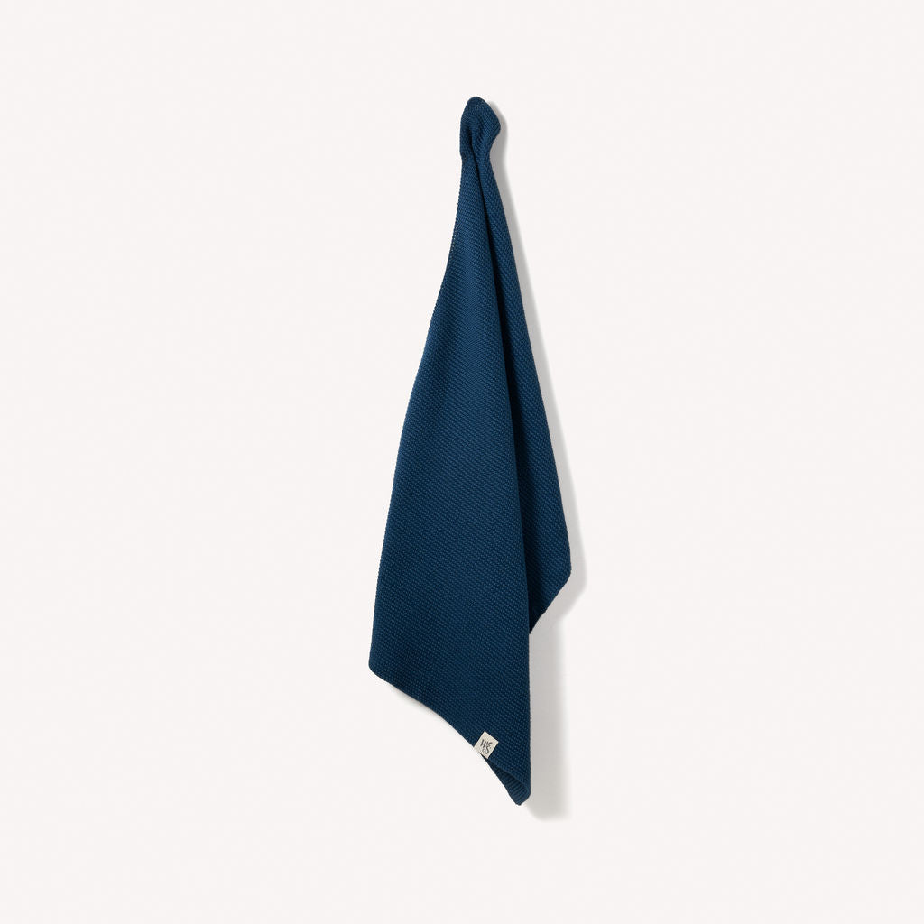 Organic cotton hand towels by Wild And Stone, soft and absorbent, featuring natural woven textures for bathroom or kitchen use.