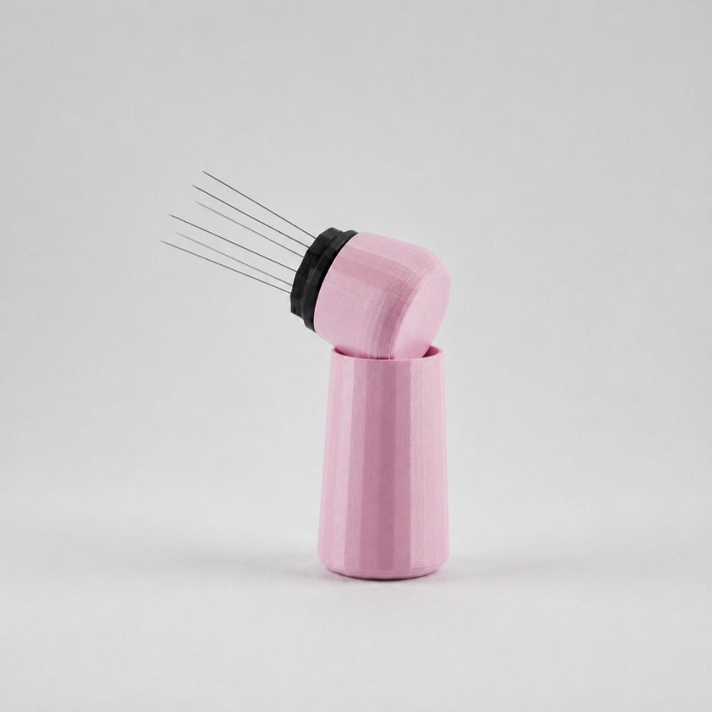 Pink KNOCDIC® Espresso WDT Tool with standing holder for precise coffee grounds distribution in espresso preparation.