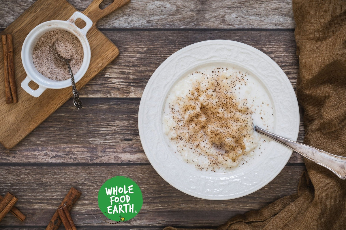 Whole Food Earth Arborio Rice, GMO-free, natural, vegan, dairy-free, no added sugar, in a clear bag.