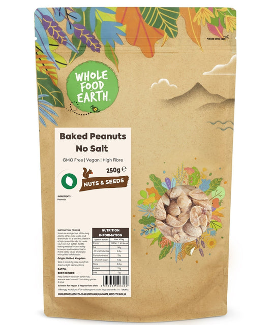 Baked unsalted peanuts from Whole Food Earth, GMO-free nuts and seeds snack in a clear bowl on a wooden surface.