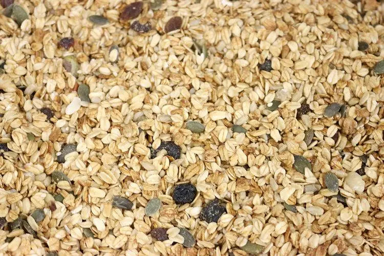 Whole Food Earth Deluxe Muesli cereal with flakes, dried fruit, nuts, and seeds in a natural, GMO-free, vegan, dairy-free blend.