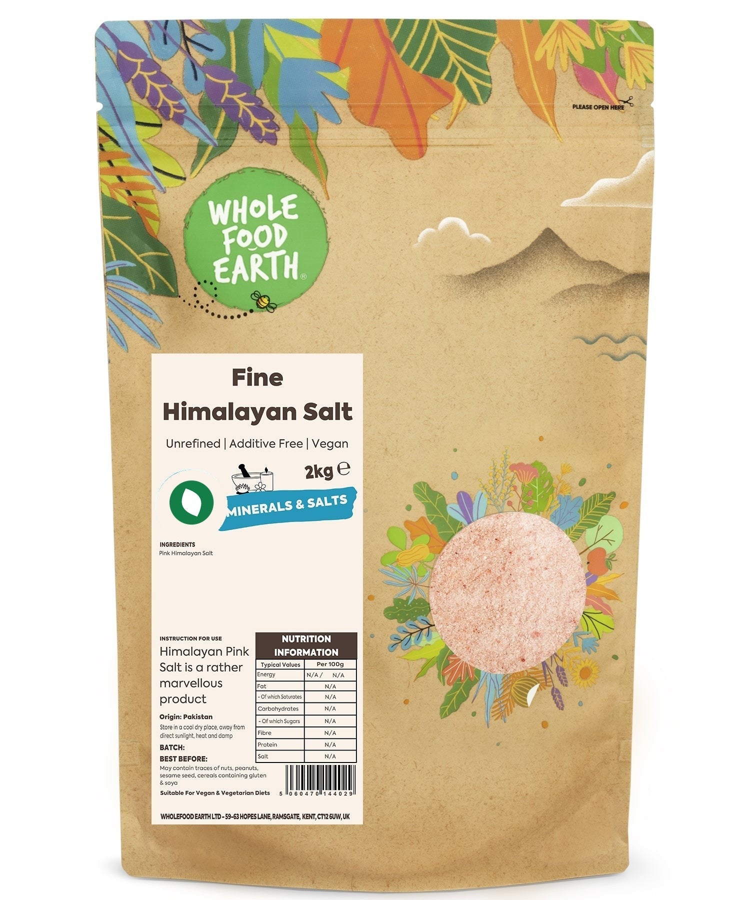 Unrefined fine Himalayan salt grains from Whole Food Earth, showing pink mineral-rich crystals on a white background.