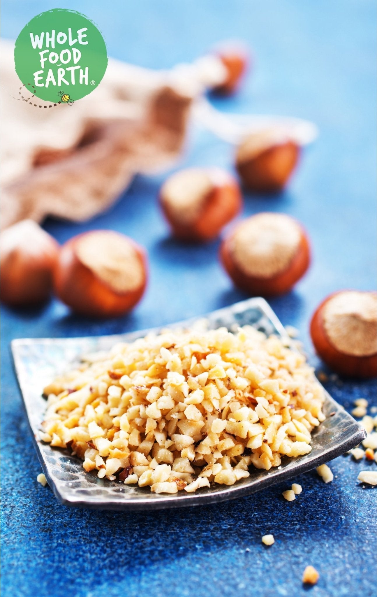 Nibbed hazelnuts from Whole Food Earth, GMO-free, vegan, dairy-free, with no added sugar, ideal for snacking or baking.