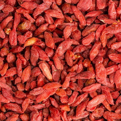 Dried Goji Berries from Whole Food Earth, raw and sun-dried, GMO-free superfood with bright red color and plump appearance.