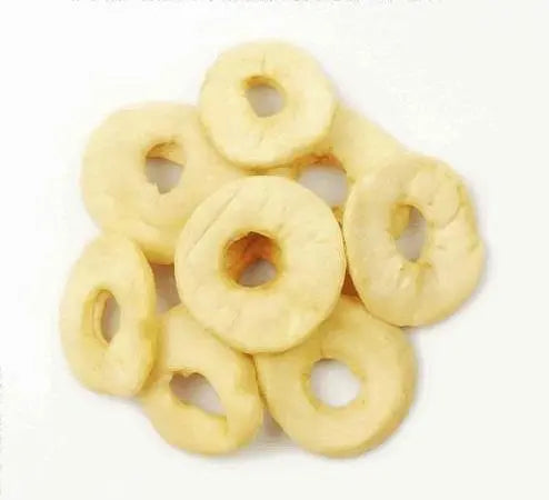 Organic dried apple rings from Whole Food Earth, showing golden, sliced dried fruit with a natural, slightly wrinkled texture.
