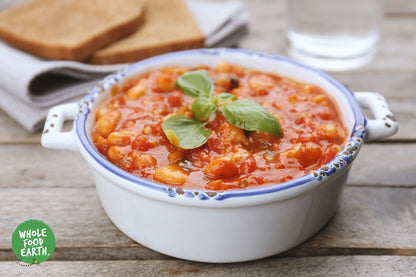Organic Butter Beans from Whole Food Earth, GMO-free beans and pulses in a clear bowl, ready for cooking or serving.