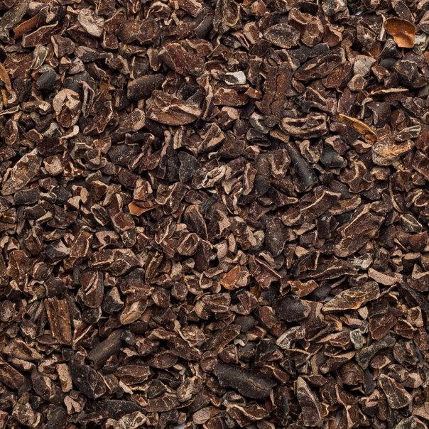 Organic cacao nibs from Whole Food Earth, raw, vegan, GMO-free specialty cacao nibs from Peru, shown in a close-up image.