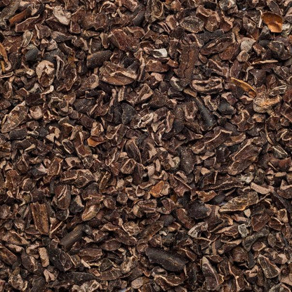 Organic cacao nibs from Whole Food Earth, raw, vegan, GMO-free specialty cacao nibs from Peru, shown in a close-up image.