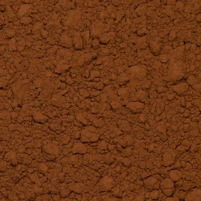 Organic alkalised cocoa powder from Whole Food Earth, displayed in a natural setting, highlighting its vegan, low-fat, and dairy-free qualities.