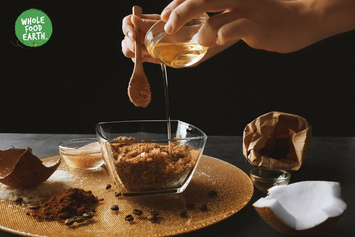 Organic coconut sugar from Whole Food Earth, natural sweetener with a brown, granulated appearance in a clear jar.