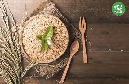 Organic Jasmine Brown Rice from Whole Food Earth, raw, GMO-free, vegan, and additive-free in a clear package.