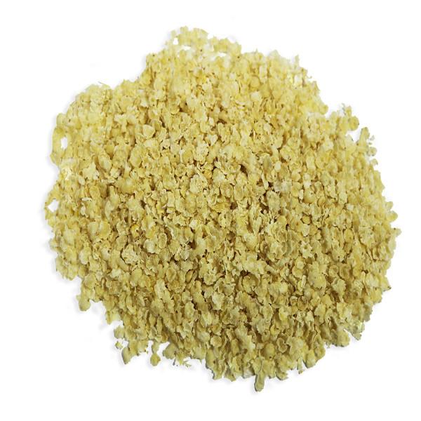 Organic millet flakes cereal by Whole Food Earth, GMO-free, showing golden millet flakes in a bowl on a white background.