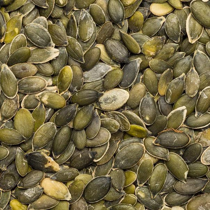Raw organic pumpkin seeds from Whole Food Earth, GWS AA Austria, GMO-free, vegan, and additive-free in a clear package.