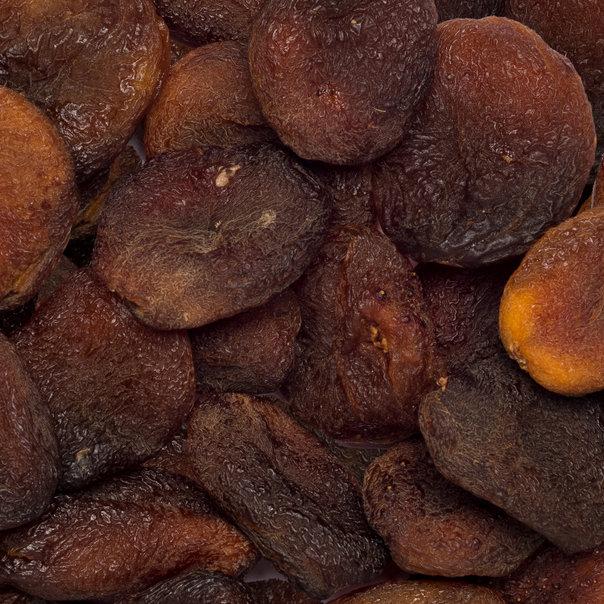 Assorted organic pitted whole apricots from Whole Food Earth, dried fruits with natural, GMO-free appearance.