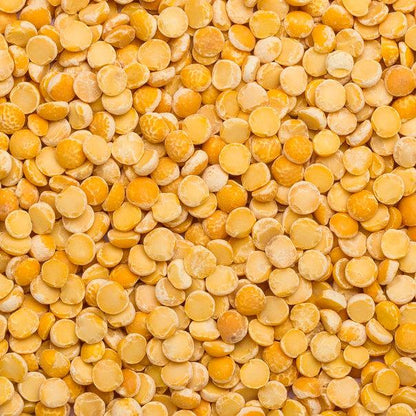 Organic yellow split peas from Whole Food Earth, showing a close-up of vibrant, dry beans in a burlap sack.