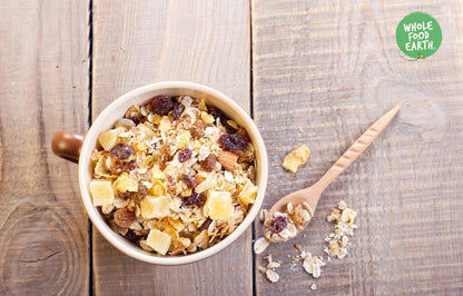 Whole Food Earth Original Muesli cereal in a bowl with dried fruits and nuts, showcasing a natural, wholesome breakfast option.
