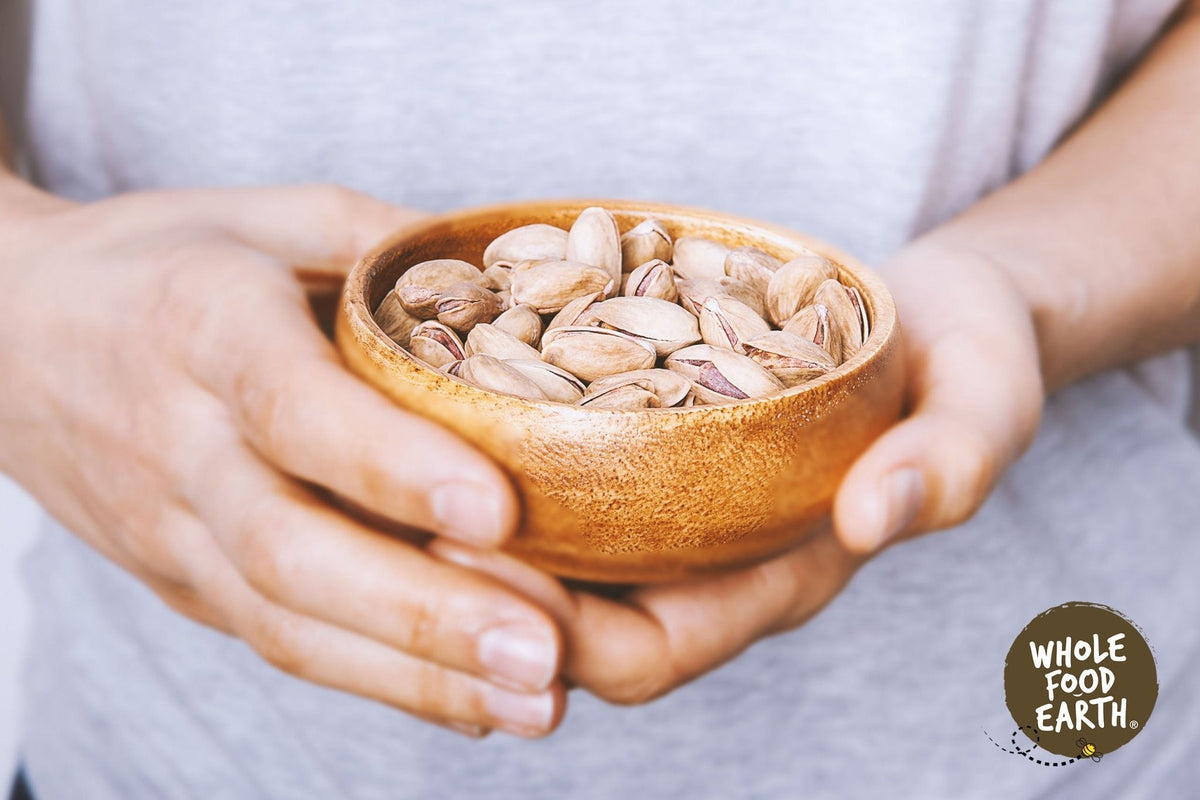 Roasted and salted pistachios from Whole Food Earth, GMO-free nuts and seeds in a close-up view
