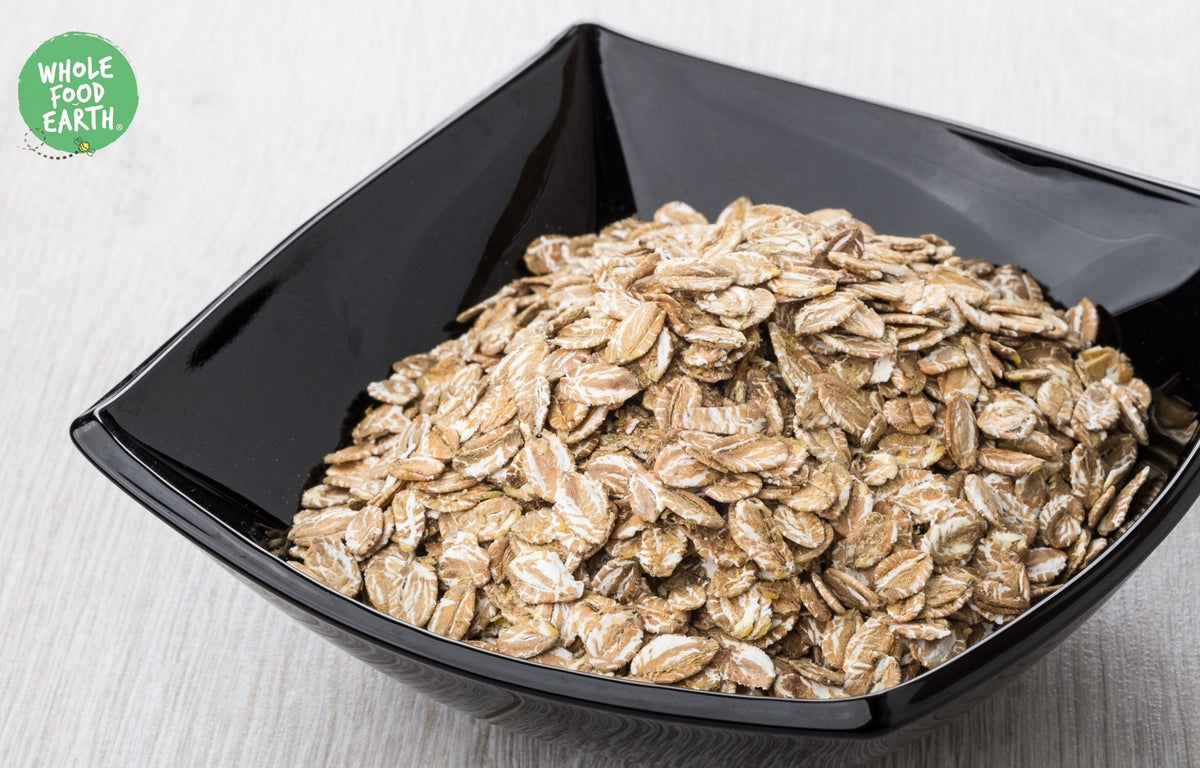 Whole Food Earth rye flakes in a bowl, showcasing GMO-free, vegan, dairy-free, and no-added-sugar speciality cereal