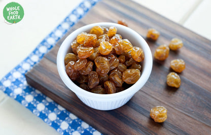 Dried Turkish Sultanas from Whole Food Earth, GMO-free, vegan, dairy-free, and no added sugar, close-up of golden sultanas in a bowl