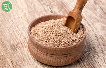 Fine wheat bran cereal from Whole Food Earth, GMO-free, vegan, dairy-free, with no added sugar, shown in a close-up image.