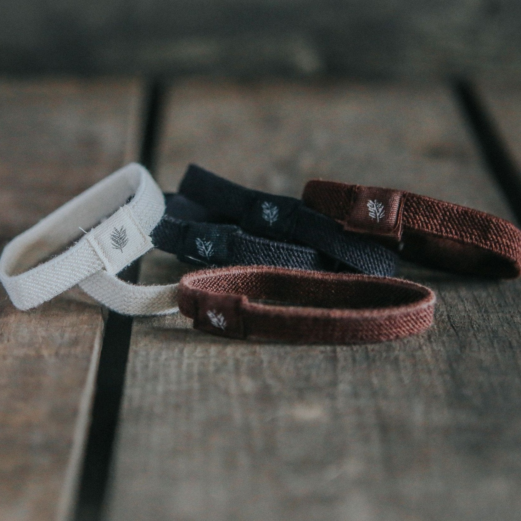 Six natural plastic-free hair ties from Wild And Stone, soft and eco-friendly hair accessories on a neutral background.