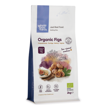 Dried organic figs from Whole Food Earth, showing a close-up of plump, textured figs in a natural, earthy setting.