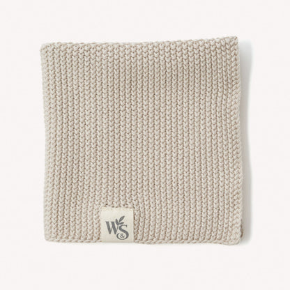 Organic cotton dishcloth from Wild And Stone, showing a soft, eco-friendly reusable dish cloth with a textured surface for cleaning.